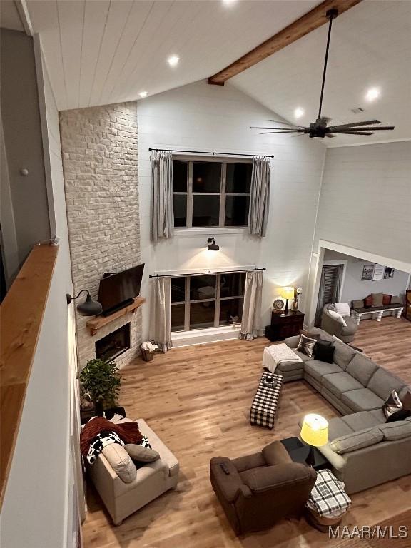2533 Weldon Rd, Tallassee, AL 36078 - living area featuring wood finished floors, a large fireplace, recessed lighting, and ceiling fan