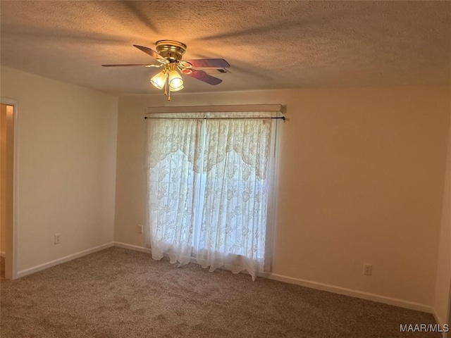 176 Lawrence Cv, Valley Grande, AL 36703 - unfurnished room featuring ceiling fan, carpet flooring, a textured ceiling, and baseboards