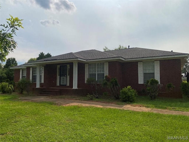 176 Lawrence Cv, Valley Grande, AL 36703 - ranch-style house featuring a front lawn, covered porch, and brick siding