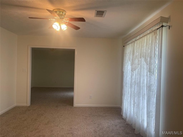 176 Lawrence Cv, Valley Grande, AL 36703 - carpeted spare room featuring ceiling fan and baseboards