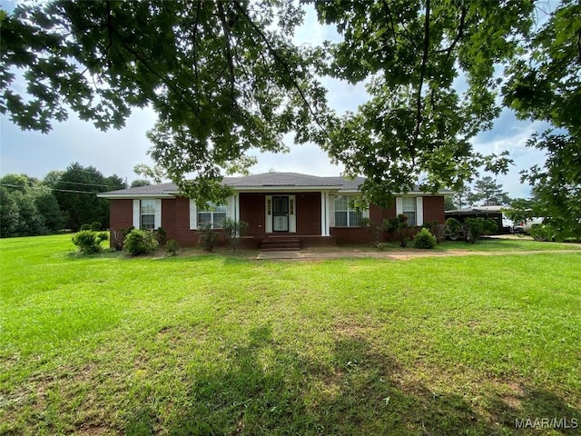 176 Lawrence Cv, Valley Grande, AL 36703 - ranch-style house featuring a front yard and brick siding