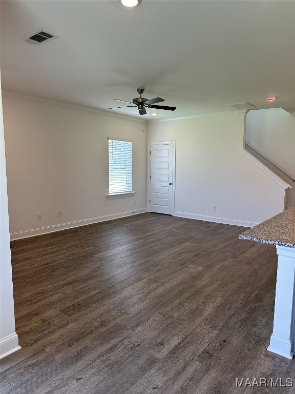5168 Sedona Dr, Montgomery, AL 36116 - spare room with crown molding, dark wood-type flooring, ceiling fan, and baseboards