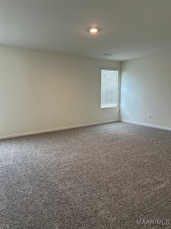 5168 Sedona Dr, Montgomery, AL 36116 - carpeted spare room with baseboards