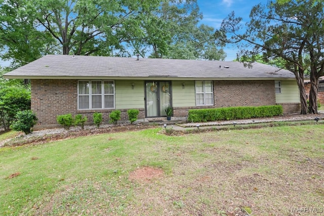 6221 Hinchcliff Dr, Montgomery, AL 36117 - ranch-style house with brick siding and a front lawn