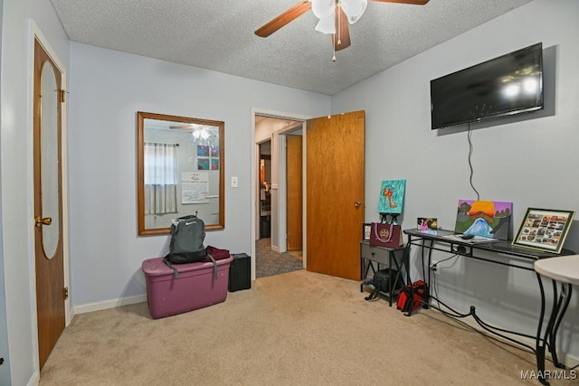 6221 Hinchcliff Dr, Montgomery, AL 36117 - carpeted bedroom featuring a textured ceiling, ceiling fan, and baseboards