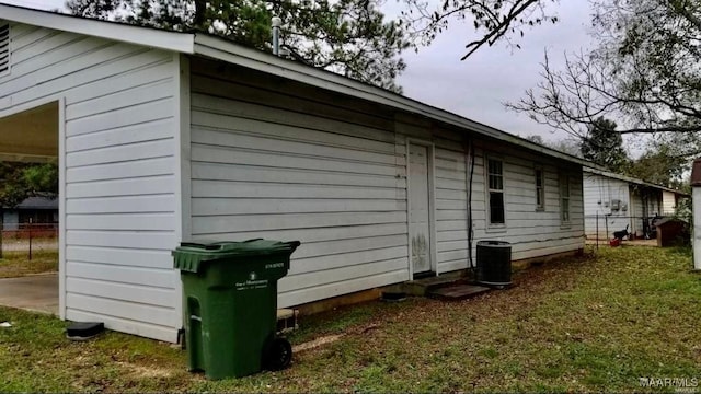 124 W Michigan Ave, Montgomery, AL 36110 - view of home's exterior featuring cooling unit and fence