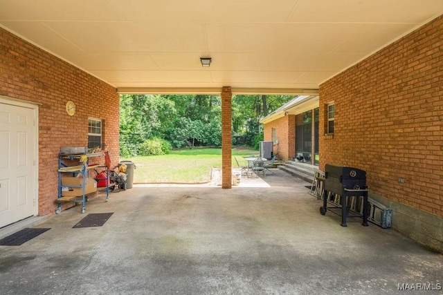 view of patio featuring an attached carport and cooling unit