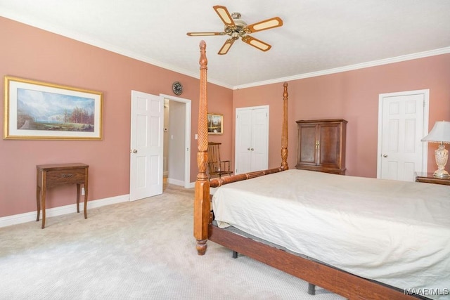 bedroom with light colored carpet, ornamental molding, baseboards, and ceiling fan