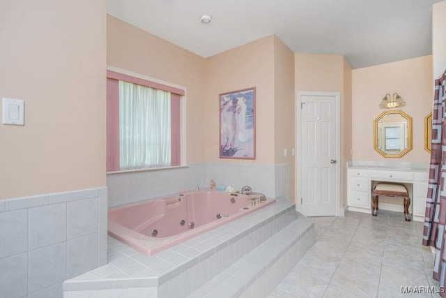 full bath with a whirlpool tub and tile patterned flooring