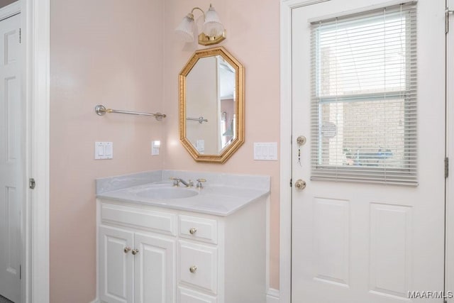 bathroom featuring healthy amount of natural light and vanity