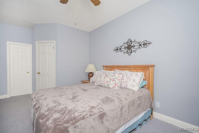 carpeted bedroom with baseboards and ceiling fan
