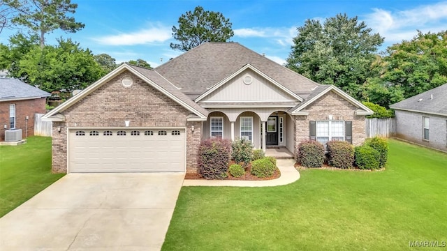612 Coleman Way, Prattville, AL 36067 - traditional-style home with central AC unit, a porch, a front lawn, a garage, and driveway