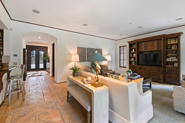 1777 Barganier Rd, Cecil, AL 36013 - living area with stone tile floors, french doors, arched walkways, and recessed lighting