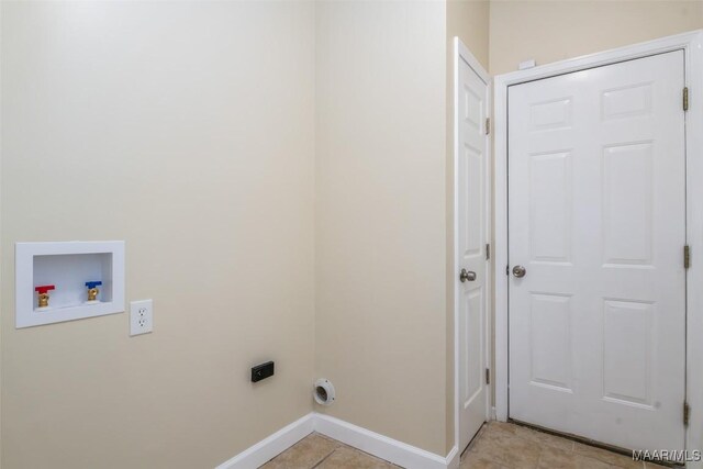 2224 Halcyon Blvd, Montgomery, AL 36117 - laundry room with baseboards, hookup for an electric dryer, hookup for a washing machine, and light tile patterned floors