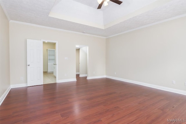 2224 Halcyon Blvd, Montgomery, AL 36117 - empty room featuring wood finished floors, ceiling fan, a tray ceiling, baseboards, and a textured ceiling