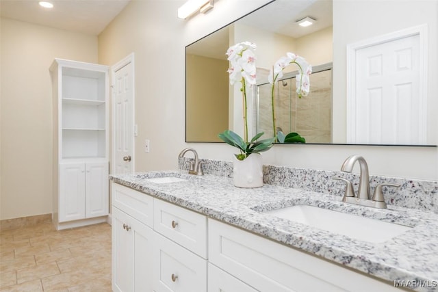 2224 Halcyon Blvd, Montgomery, AL 36117 - full bathroom with a stall shower, double vanity, recessed lighting, baseboards, and tile patterned flooring