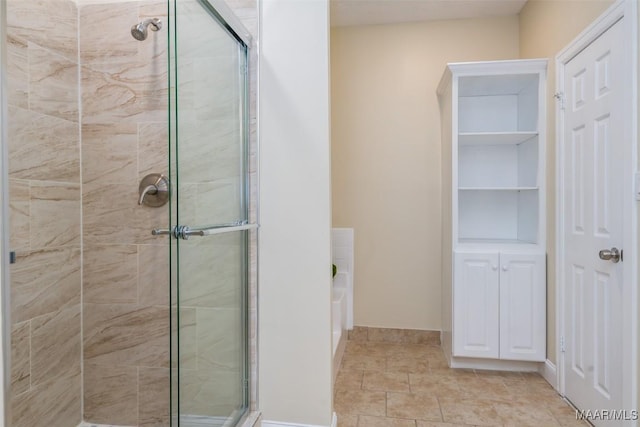 2224 Halcyon Blvd, Montgomery, AL 36117 - bathroom with a shower stall, a garden tub, built in features, and baseboards