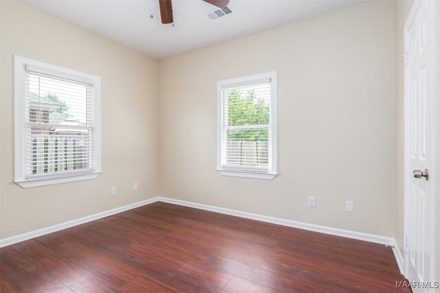 2224 Halcyon Blvd, Montgomery, AL 36117 - empty room with dark wood-style floors, baseboards, and a ceiling fan