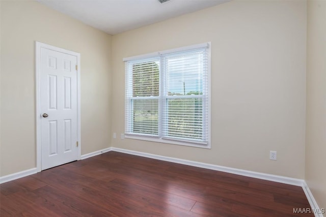 2224 Halcyon Blvd, Montgomery, AL 36117 - spare room featuring dark wood-style floors and baseboards