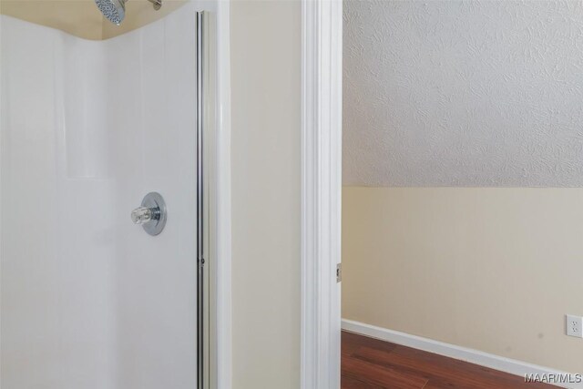 2224 Halcyon Blvd, Montgomery, AL 36117 - full bathroom with a shower, wood finished floors, and baseboards