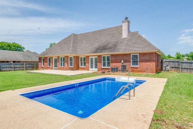2224 Halcyon Blvd, Montgomery, AL 36117 - view of swimming pool featuring cooling unit, a patio area, and french doors