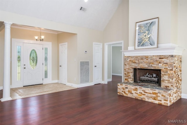 2224 Halcyon Blvd, Montgomery, AL 36117 - entrance foyer featuring wood finished floors, a chandelier, high vaulted ceiling, baseboards, and a fireplace