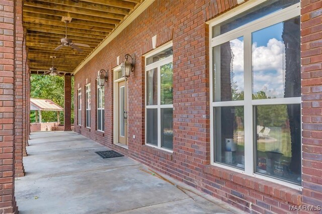 view of patio / terrace featuring a ceiling fan and a porch