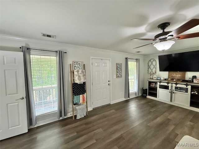 419 County Road 16, Valley Grande, AL 36701 - living room featuring ornamental molding, ceiling fan, dark wood-style flooring, and baseboards