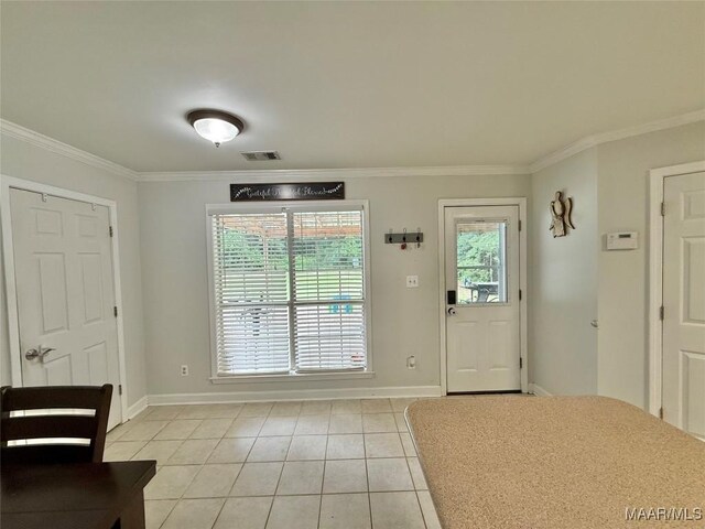 419 County Road 16, Valley Grande, AL 36701 - foyer with ornamental molding, light tile patterned flooring, and baseboards