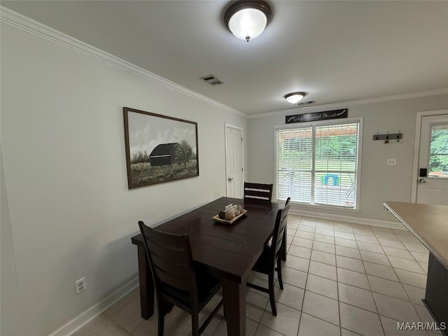 419 County Road 16, Valley Grande, AL 36701 - dining space with ornamental molding, light tile patterned floors, and baseboards