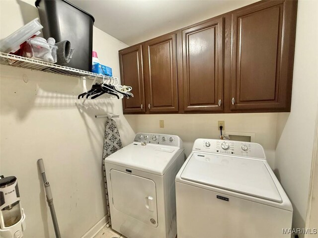 419 County Road 16, Valley Grande, AL 36701 - washroom with cabinet space and independent washer and dryer