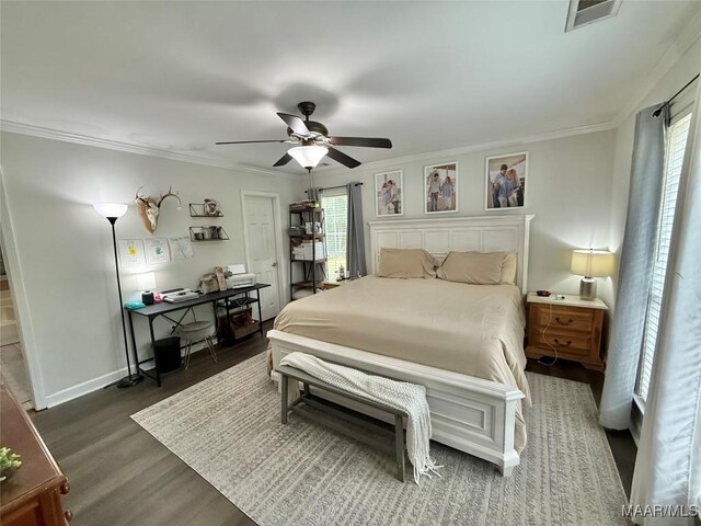 419 County Road 16, Valley Grande, AL 36701 - bedroom featuring wood finished floors, a ceiling fan, ornamental molding, baseboards, and an office area