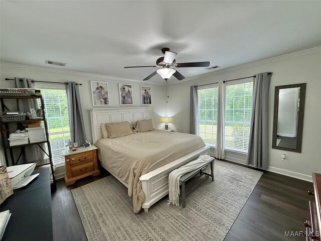 419 County Road 16, Valley Grande, AL 36701 - bedroom featuring dark wood finished floors, crown molding, multiple windows, baseboards, and a ceiling fan