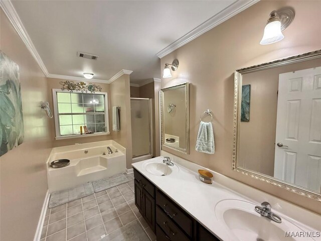 419 County Road 16, Valley Grande, AL 36701 - full bathroom with a stall shower, a bath, tile patterned flooring, double vanity, and ornamental molding