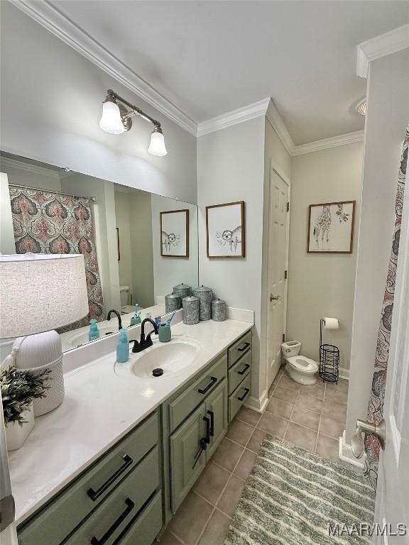 419 County Road 16, Valley Grande, AL 36701 - full bath featuring toilet, tile patterned floors, ornamental molding, and vanity