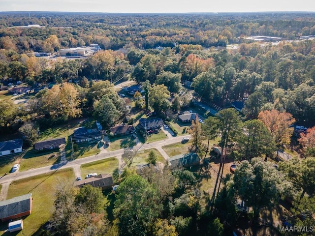 205 9th Ave, Selma, AL 36701 - aerial view of property and surrounding area featuring a heavily wooded area