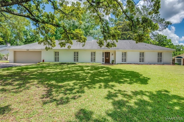 2527 Hermitage Dr, Montgomery, AL 36111 - ranch-style home featuring an attached garage, driveway, a front yard, and stucco siding