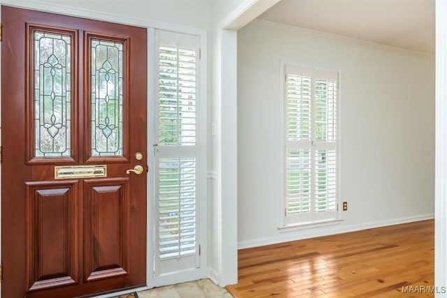 2527 Hermitage Dr, Montgomery, AL 36111 - entrance foyer with baseboards, light wood-type flooring, and ornamental molding