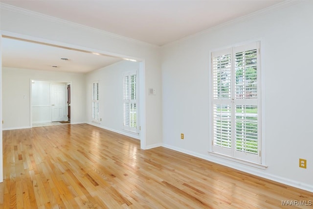 2527 Hermitage Dr, Montgomery, AL 36111 - empty room featuring light wood-style floors, crown molding, and baseboards