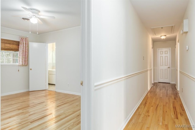 2527 Hermitage Dr, Montgomery, AL 36111 - hall with attic access, light wood-style flooring, and baseboards