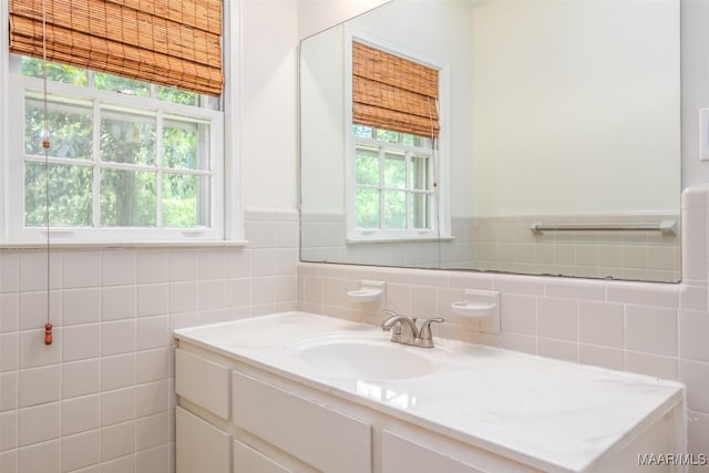 2527 Hermitage Dr, Montgomery, AL 36111 - bathroom with vanity and tile walls