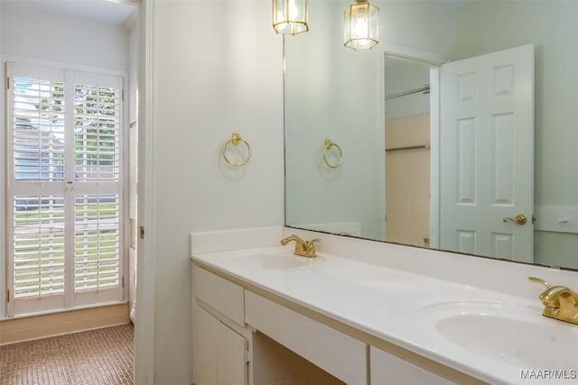 2527 Hermitage Dr, Montgomery, AL 36111 - bathroom featuring double vanity and tile patterned flooring