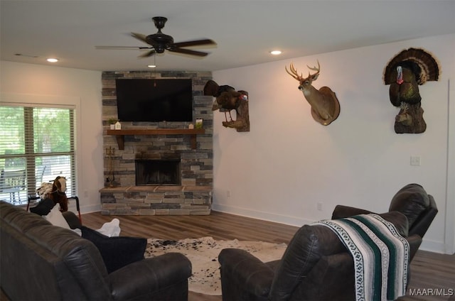 7330 Butler Mill Rd, Ramer, AL 36069 - living room featuring a stone fireplace, ceiling fan, wood finished floors, baseboards, and recessed lighting