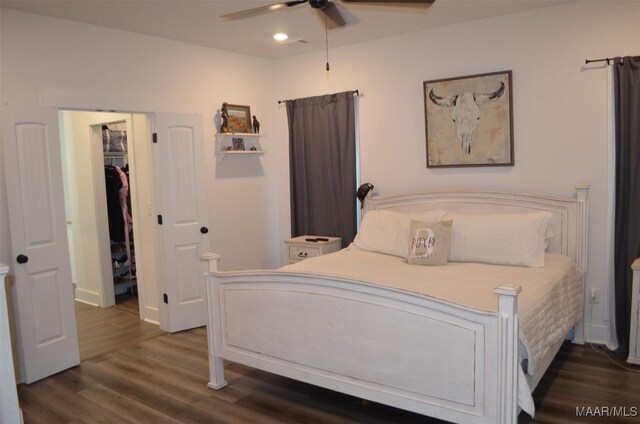 7330 Butler Mill Rd, Ramer, AL 36069 - bedroom featuring wood finished floors, recessed lighting, a walk in closet, a ceiling fan, and a closet