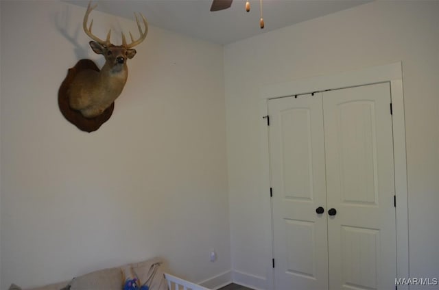 7330 Butler Mill Rd, Ramer, AL 36069 - unfurnished bedroom featuring a closet, a ceiling fan, and baseboards