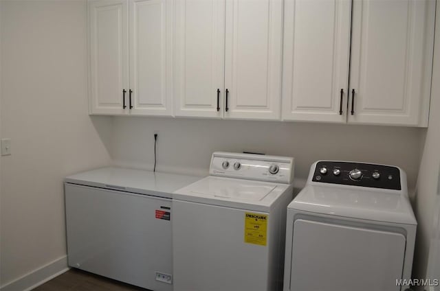 7330 Butler Mill Rd, Ramer, AL 36069 - laundry area with separate washer and dryer, cabinet space, baseboards, and dark wood-style floors
