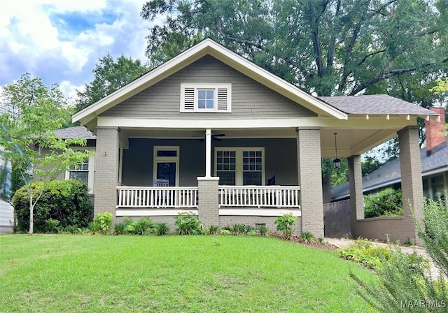356 Cloverdale Rd, Montgomery, AL 36104 - view of front of home with covered porch, a front lawn, a ceiling fan, and brick siding