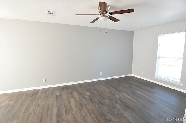 445 Durden Rd, Prattville, AL 36067 - spare room with baseboards, dark wood-style floors, and a ceiling fan