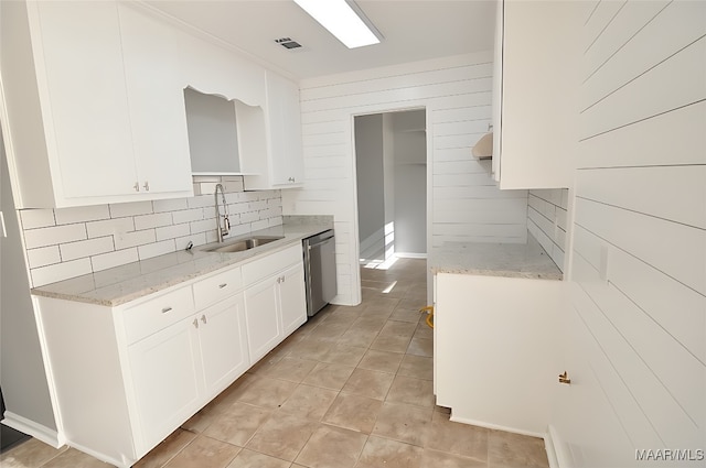 445 Durden Rd, Prattville, AL 36067 - kitchen with a sink, dishwasher, decorative backsplash, light tile patterned flooring, and white cabinets