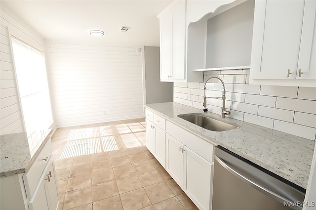 445 Durden Rd, Prattville, AL 36067 - kitchen with dishwasher, a sink, backsplash, and white cabinets